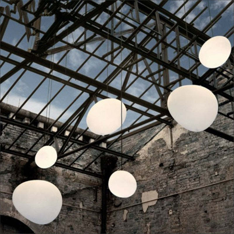 Sleek Egg Shaped Glass Pendant Light For Ambient Glow