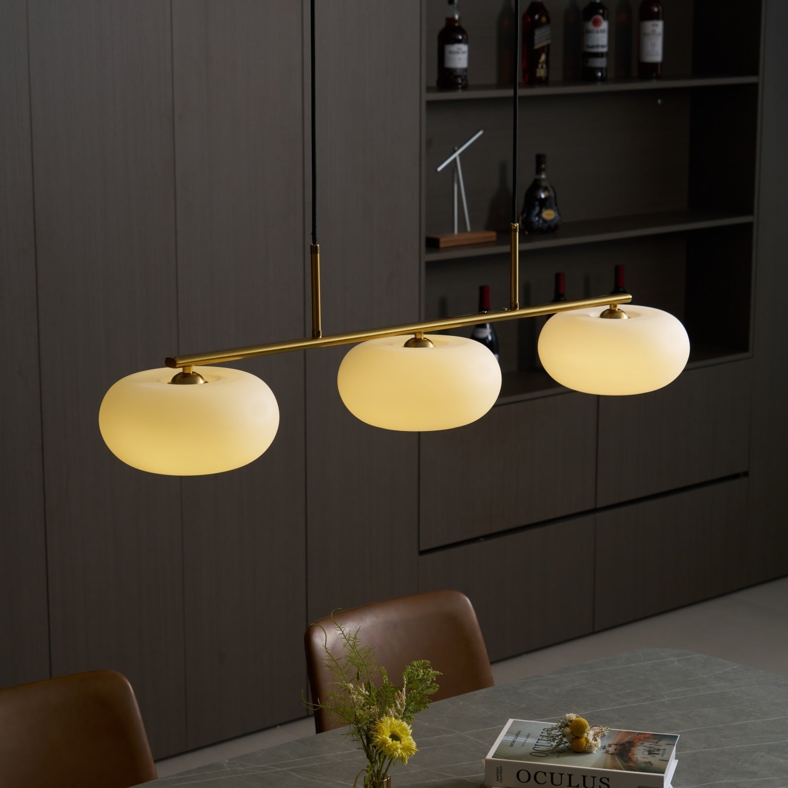 Cream Glass Pendant Light With Three Shades And Warm Glow