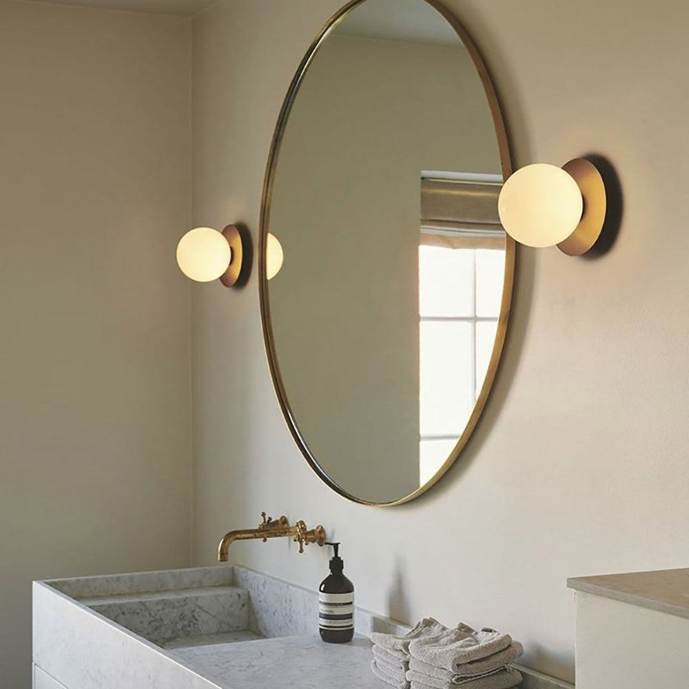 Elegant Sphere Glass Wall Light With Metal Finishes