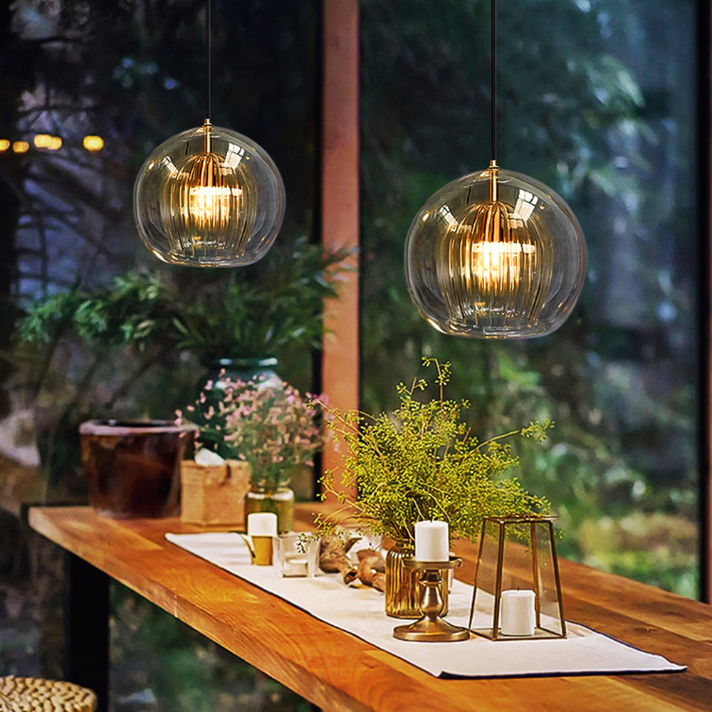Glass Globe Pendant Light For Modern Ambience Clear Or Amber