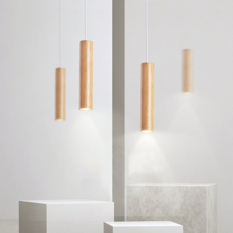 Wood Cylinder Pendant Light With Warm Ambient Glow