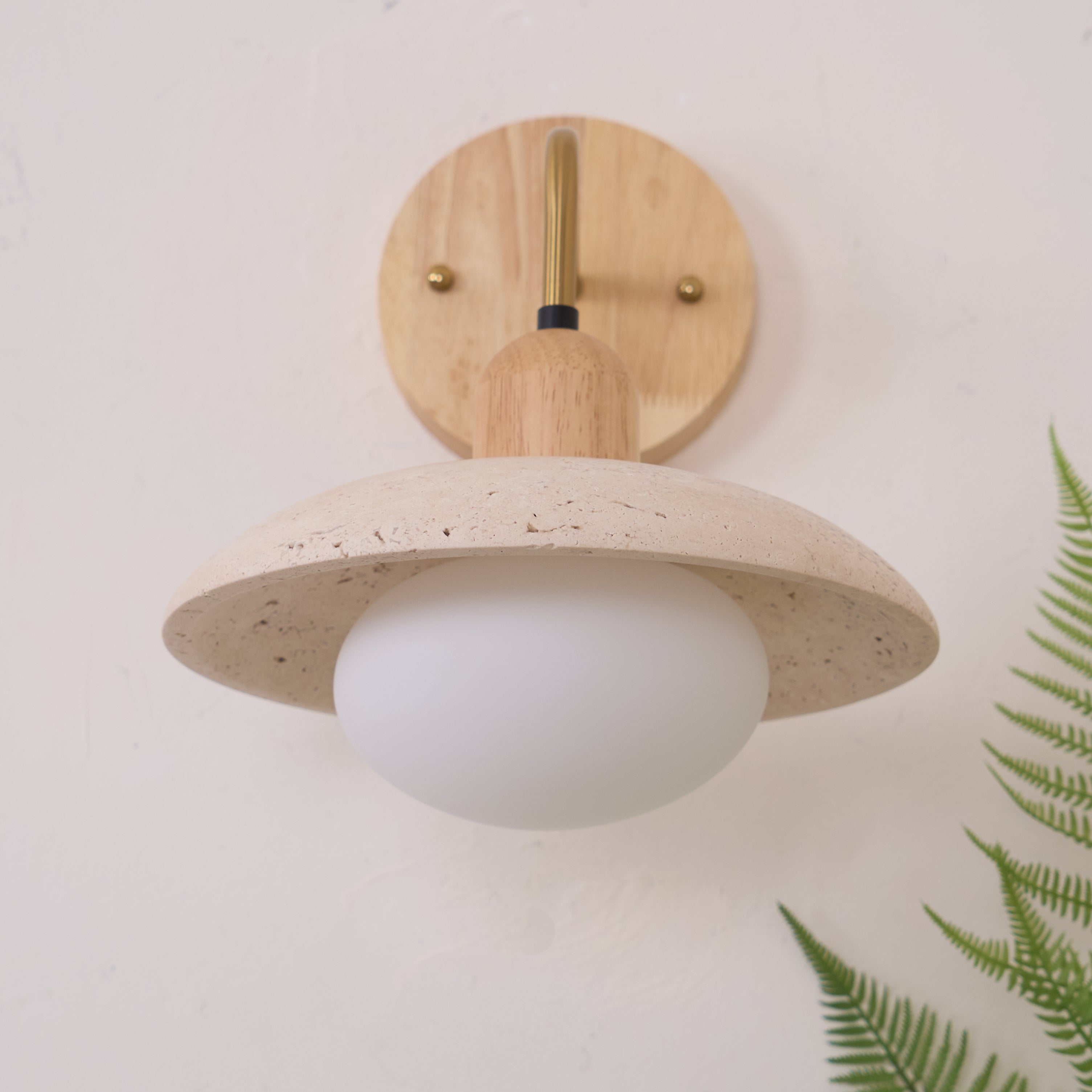 Aria Mid Century Travertine Wall Lamp With Brushed Brass Arm