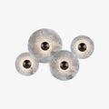 Layered Alabaster Disc Wall Lamp With Soft Glow For Living Room