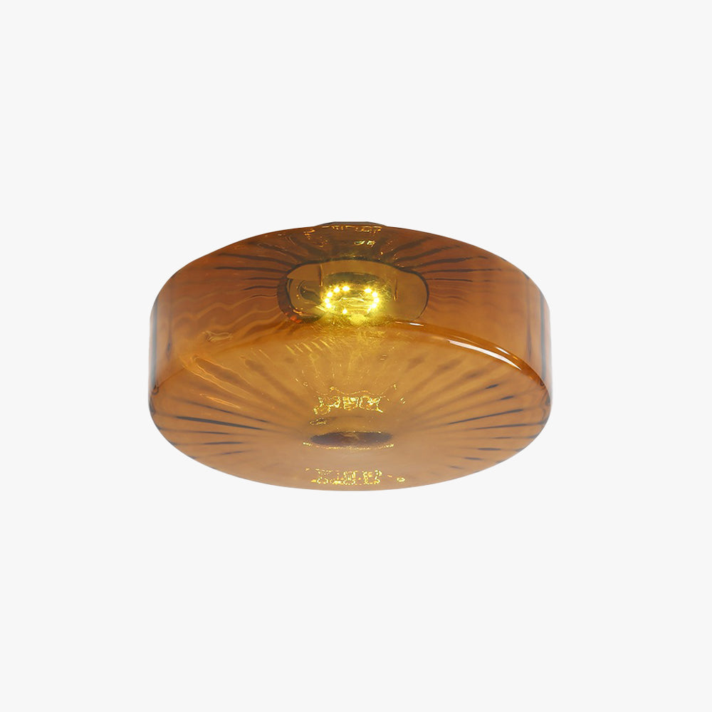 Amber Glass Ceiling Light With Sunburst Pattern And Warm Glow