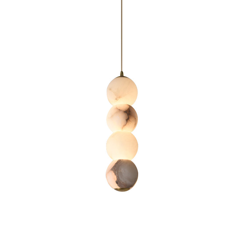 Alabaster Pendant Light With Brass Stem For Warm Ambient Lighting