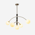 Elegant Dining Chandelier With Alabaster Look Globes And Arched Arms