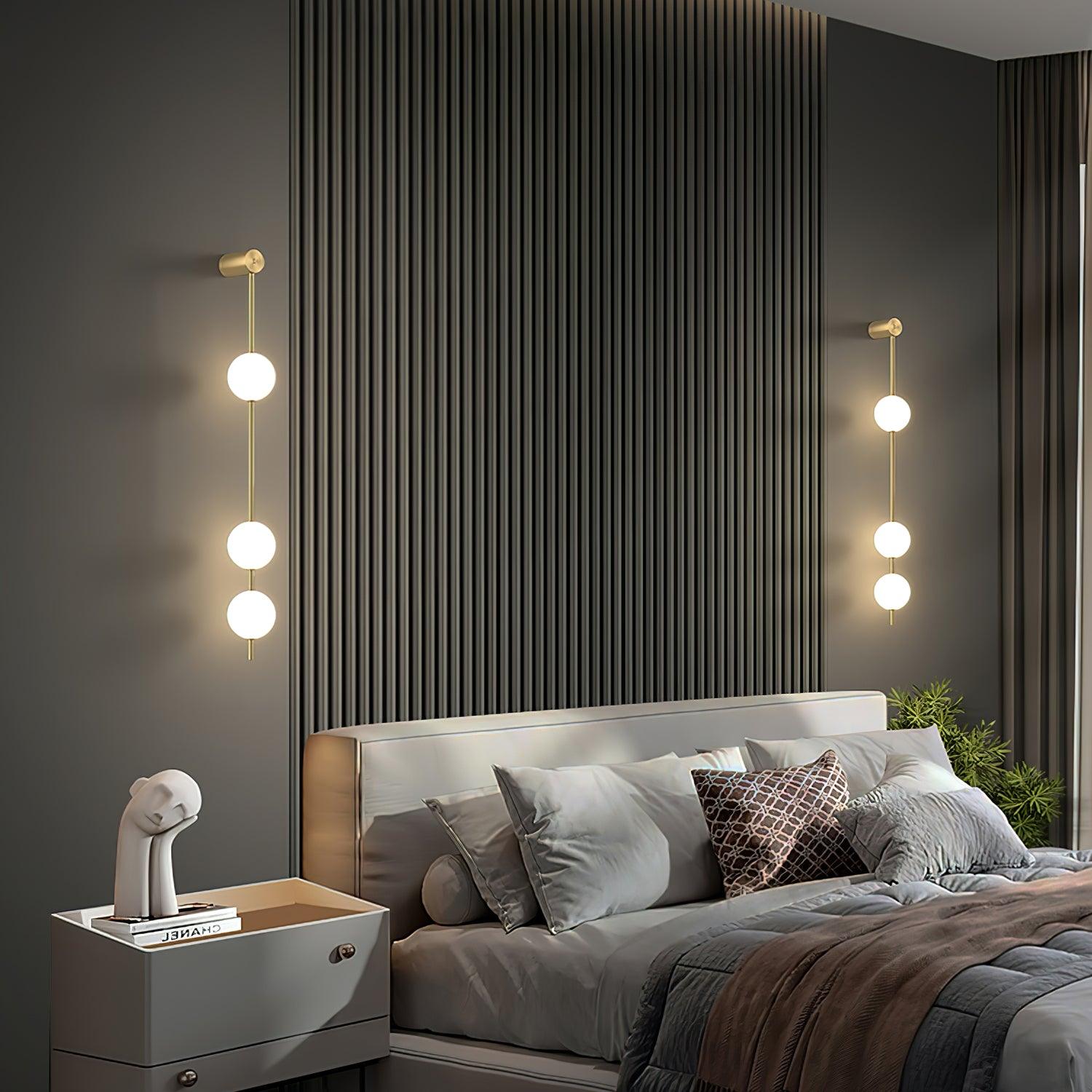 Vertical Stacked Glass Ball Wall Light With Brass Detailing