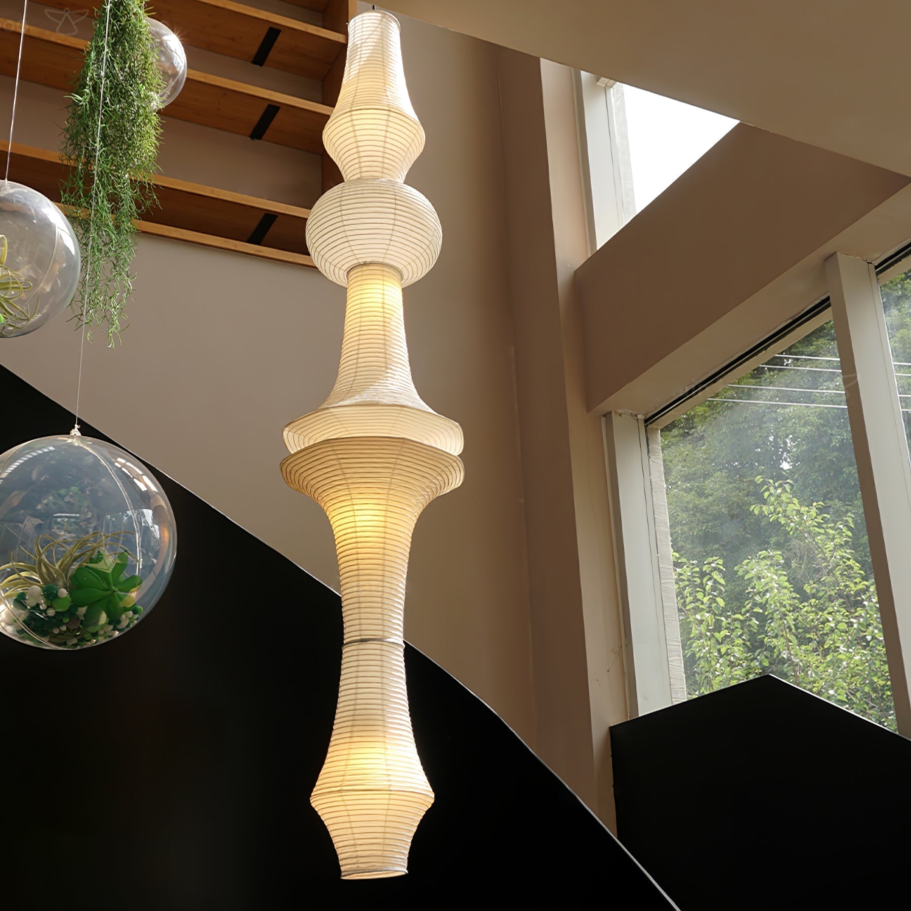 Sculptural Paper Pendant Light Vertical With Warm Glow